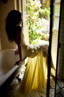 Deme By Gabriella Celeste Maxi Dress in flowing fabric with a vibrant pattern, full-length view on a model.