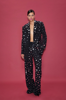 Sudi Etuz mirror-covered straight cut pants with reflective embellishments and tailored fit, shown on a model.