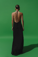 Black Baobab Rondine Maxi Dress with flowing fabric and elegant design, perfect for stylish occasions.
