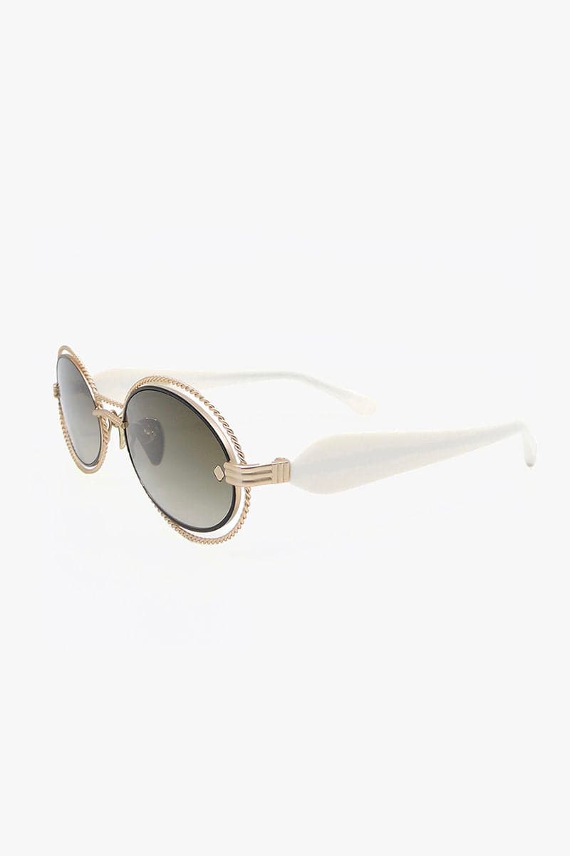 Pearl Osiris sunglasses by Moy Atelier featuring stylish pearl-accented frames and dark tinted lenses.
