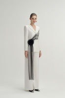 White Jane pants by Arti Apparel, stylish and comfortable pants with a relaxed fit, shown on a model.