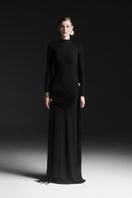 Black Maison Des Copains Miréa high neck floor-length gown with elegant design and flowing fabric on a dress form.