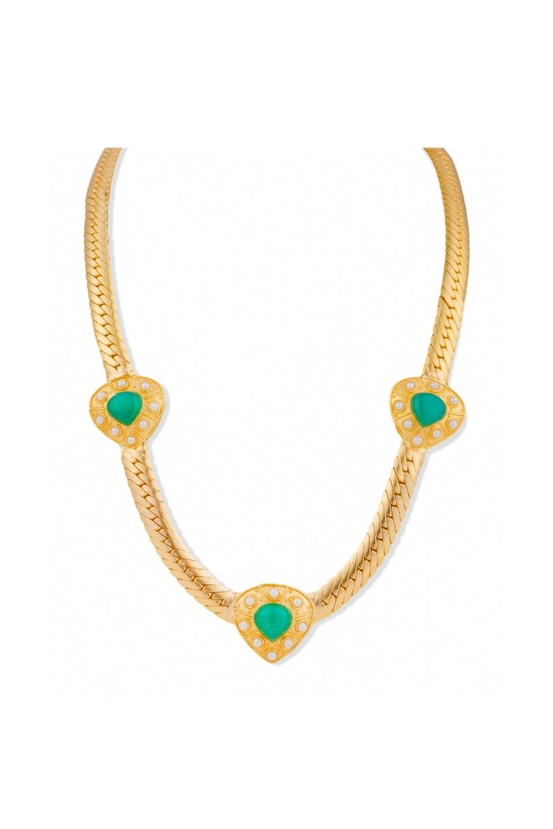 Elegant Claudia necklace by Anatina featuring a delicate chain with a stylish pendant, showcased on a neutral background.