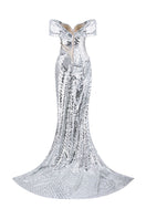 Silver HACCHIC COUTURE gown featuring elegant design, perfect for formal events, with intricate details and luxurious fabric.