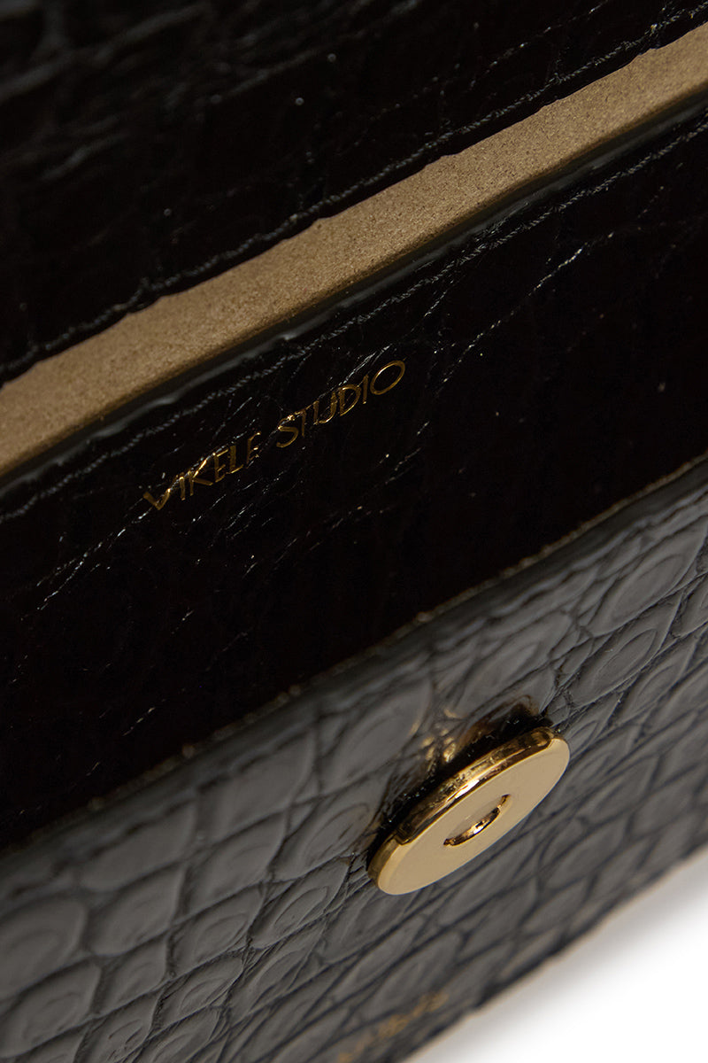 Black VIKELE STUDIO Opera clutch bag with sleek design and textured finish, perfect for evening and formal occasions.