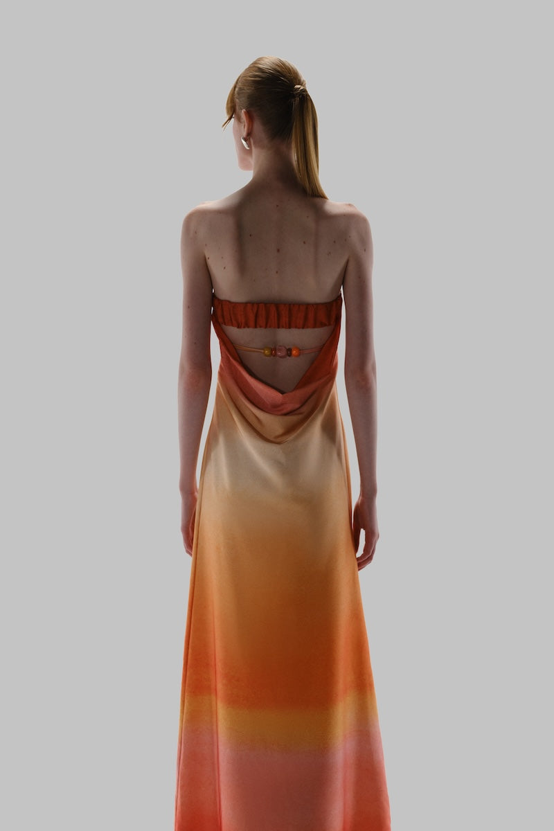 Baobab Lola Maxi Dress with flowy fabric and elegant sunset-inspired design, perfect for casual or dressy occasions.