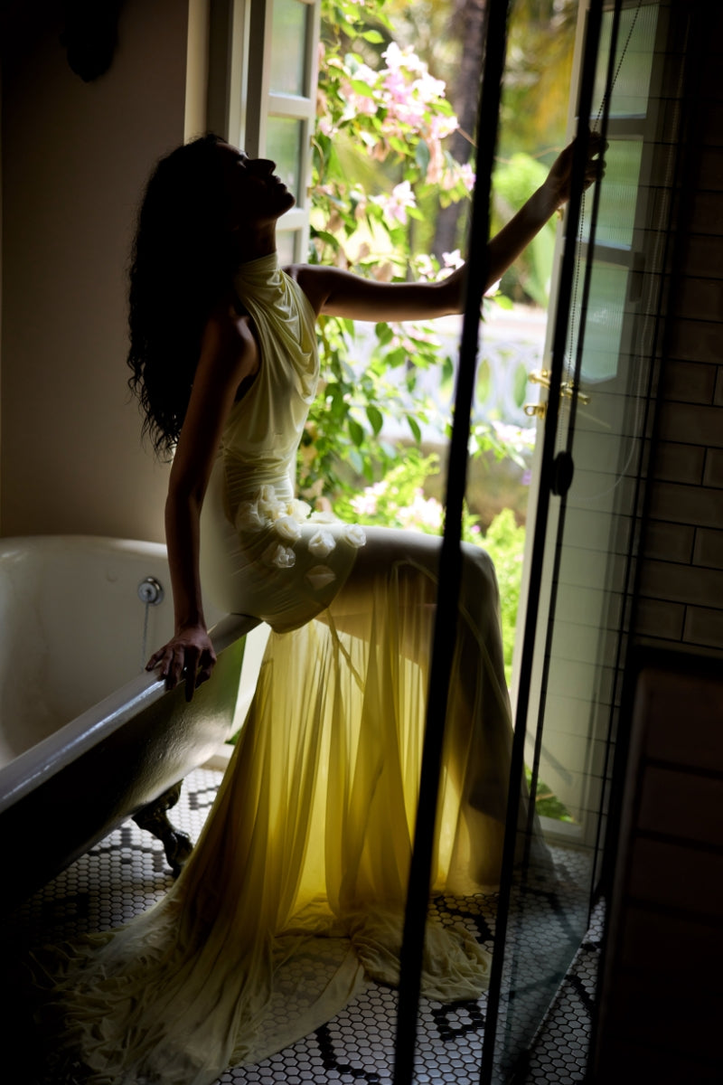 Deme By Gabriella Celeste Maxi Dress in flowing fabric with floral pattern, full-length design, and sleeveless style.