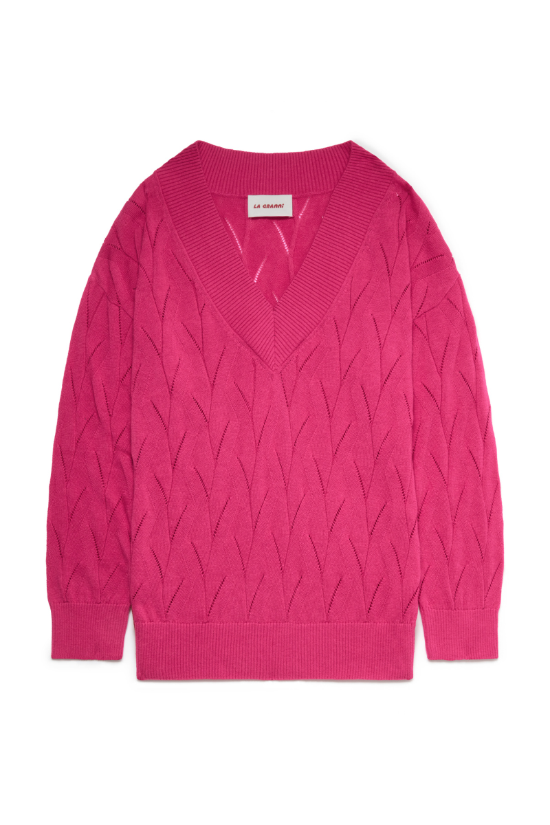 Bright pink oversized V-neck jumper by La Granni, cozy sweater with a relaxed fit and soft knit texture.