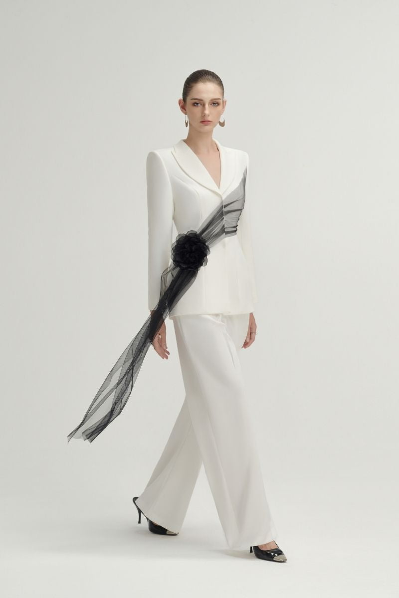 White Jane pants by Arti Apparel, stylish and comfortable women's pants shown in a well-lit product image.