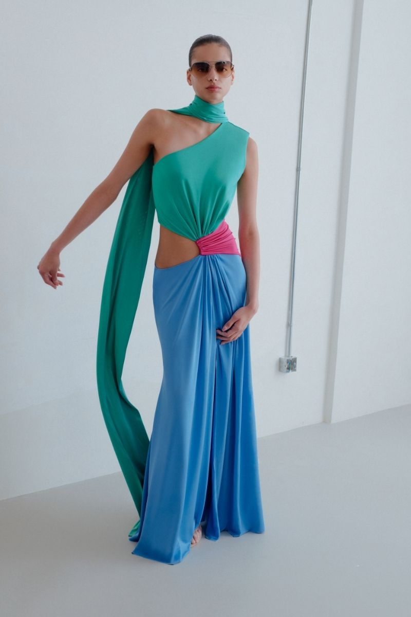 Sisters Leila maxi dress in dreamy pastel colors, flowing fabric, and elegant design, perfect for warm-weather occasions.