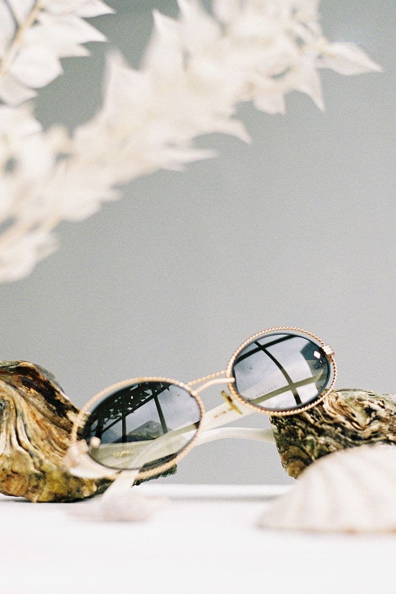 Pearl Osiris sunglasses by Moy Atelier with glossy pearl finish and stylish frame, displayed on a white background.