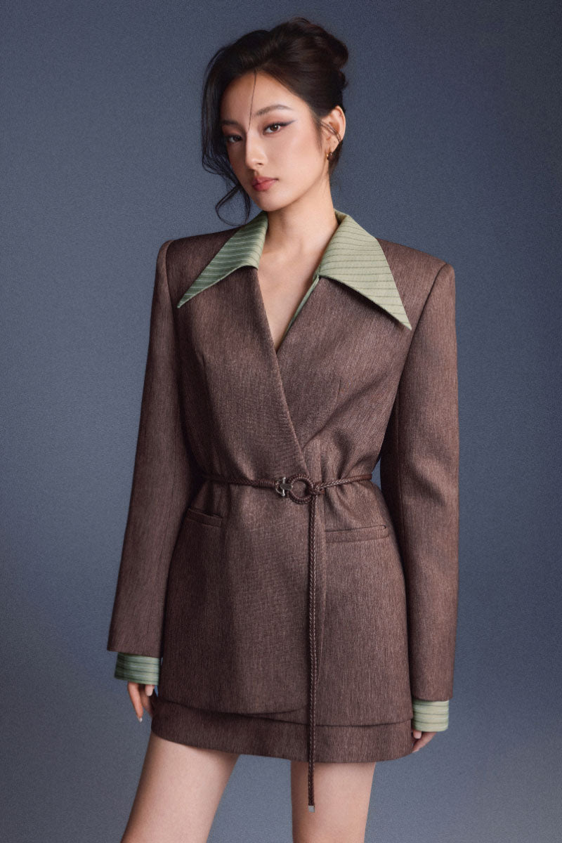 Keira Tong tailored cinched shirt featuring a fitted silhouette and stylish design, perfect for casual or professional wear.