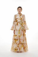 BY HAÓ Lucienne tiered maxi dress in multi-color with flowing fabric and layered design, perfect for elegant summer wear.