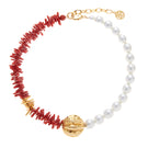 Ben Amun Basi Necklace featuring intricate gold-tone chain and decorative pendant on a white background.
