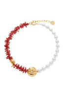 Ben Amun Basi Necklace featuring intricate gold-tone chain and decorative pendant on a white background.