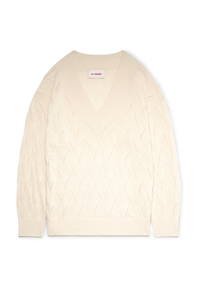 Cream oversized V-neck jumper by La Granni, featuring a relaxed fit and soft knit fabric, perfect for cozy casual wear.