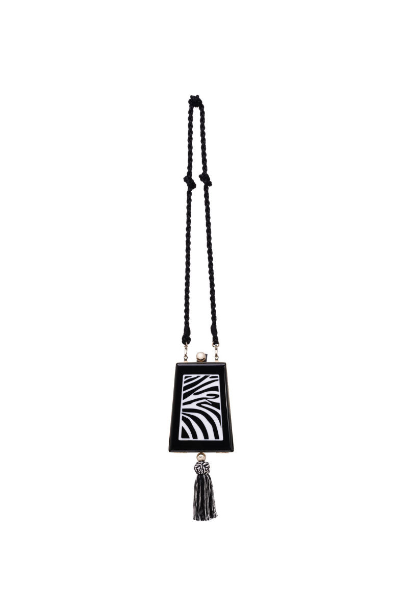 Waiwai Rio zebra print trapezoid shoulder bag with adjustable strap and spacious interior, stylishly designed for everyday use.
