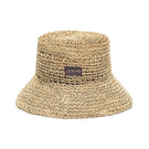 Le SH KA straw bucket hat from the VOL2 collection, featuring a wide brim and woven straw material, perfect for sun protection.