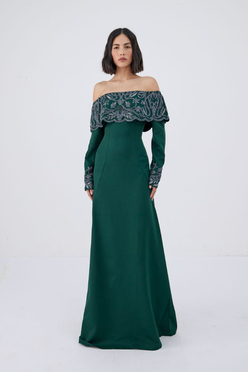 Raishma Maria Green Gown with flowing fabric and elegant design, perfect for formal occasions.