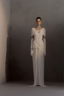 White Plan Francesca gown featuring elegant fabric and flowing design, perfect for formal occasions.