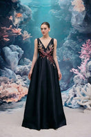 Elegant black EVELINA Royal Taffeta Dress Gown by 21Six, featuring a flowing fabric and sophisticated design.