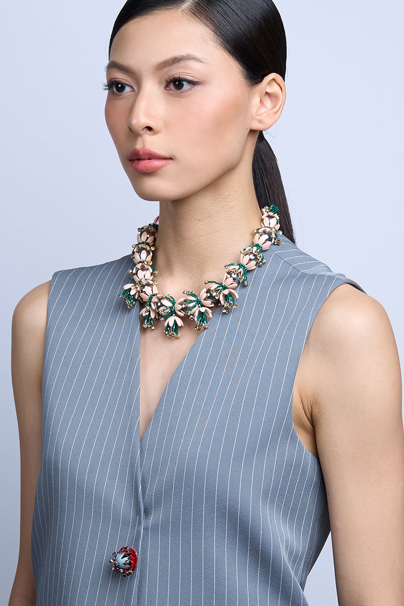 Aidan & Ice Solace Blush Necklace featuring a delicate pink pendant on a fine chain, elegant and stylish jewelry accessory.