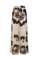 Sisters Alora beige sandstone pants with a relaxed fit, featuring a high waist and tailored design.