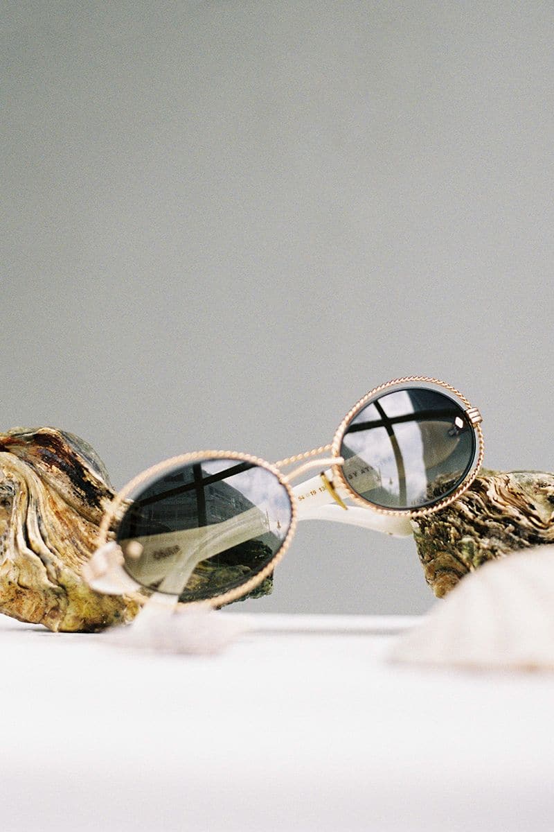 Moy Atelier Pearl Osiris sunglasses with oval frames and pearl accents, stylish eyewear for a sophisticated look.