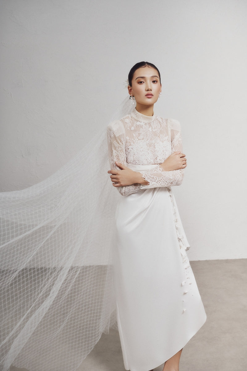 White Plan MIKOL maxi dress featuring flowing fabric and a stylish design, perfect for elegant summer occasions.