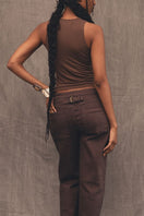 Dark brown denim tank top by TT Studios, featuring a sleeveless design and casual fit, perfect for layered summer looks.