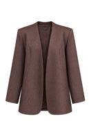 Keira Tong minimal fitted blazer shown on a model, tailored blazer with sleek design and structured fit, in a neutral color.