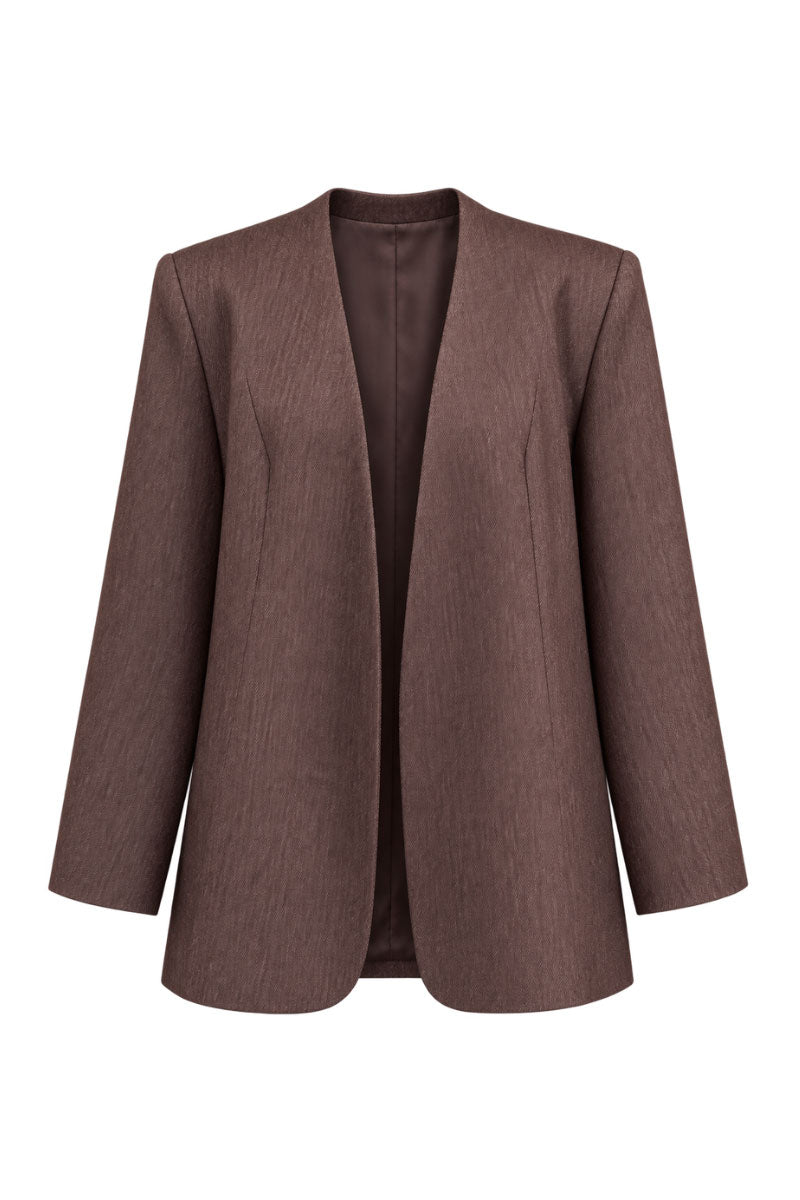 Keira Tong minimal fitted blazer shown on a model, tailored blazer with sleek design and structured fit, in a neutral color.