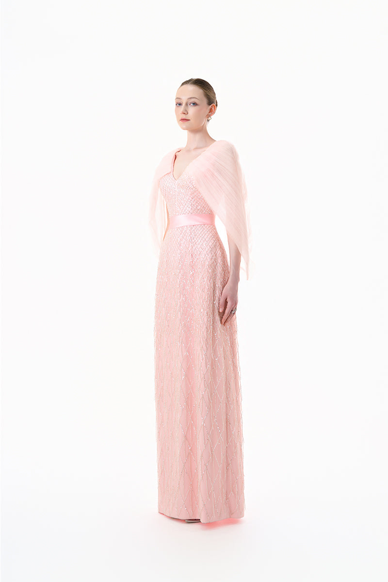Beaded blush pink V-neck cape gown by HAPPY CLOTHING, featuring intricate beadwork and elegant flowing design.