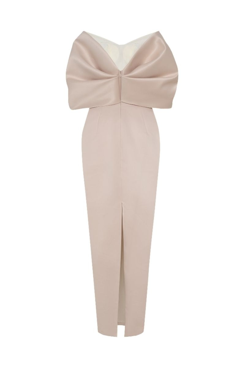 Beige off-shoulder pencil gown by HACCHIC COUTURE, featuring a fitted silhouette and elegant off-shoulder design.