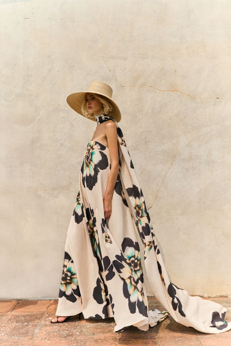 Sisters Lucy Maxi Dress in sandstone beige with a flowing fabric and elegant design, perfect for casual or formal occasions.
