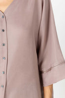 NK IMODE KACEY City Shirt Top in Freckles, stylish loungewear with a relaxed fit and playful freckle pattern, front view.
