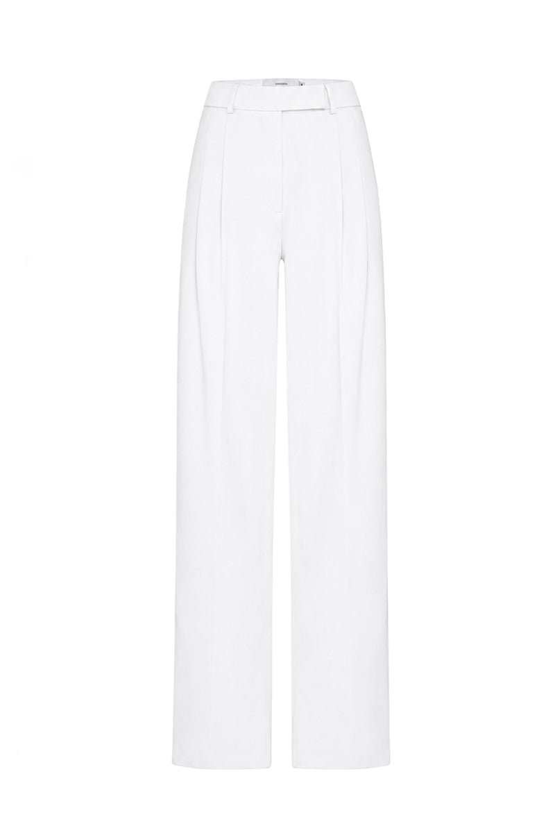 White double-pleated wide-leg pants by AWAVE displayed on a model, showcasing the flowy, relaxed fit and stylish design.