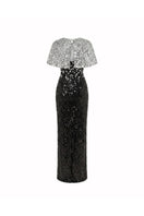 HACCHIC COUTURE Luna Crystal Cape Gown in black with silver embellishments, flowing fabric, elegant evening wear.