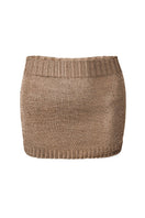Rose gold sparkly knit mini skirt by Natalia Fedner, featuring shimmering fabric and a fitted, stylish silhouette.