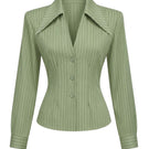 Keira Tong tailored cinched shirt displayed on a hanger, featuring a fitted design with a cinched waist and long sleeves.