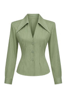 Keira Tong tailored cinched shirt displayed on a hanger, featuring a fitted design with a cinched waist and long sleeves.