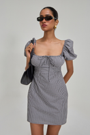 Black check mini dress by Summer Away featuring a stylish, fitted silhouette perfect for casual or evening wear.