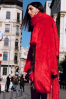 Sudi Etuz cropped faux fur coat with scarf detail, showcasing plush texture and stylish design, perfect for winter wear.