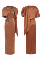 Hacchic Couture blush nude Aurora drape cape gown showcasing flowing fabric and elegant design on model.