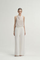 White Jane Pants by Arti Apparel, stylish women's pants with a relaxed fit and clean design, shown in a full-length view.