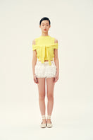 Yellow Martha vest from Chictopia, a stylish women's top with a fitted design and vibrant color, shown on a model.