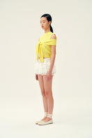 Yellow Martha vest from Chictopia, a stylish sleeveless top with a fitted design, perfect for casual or layered looks.