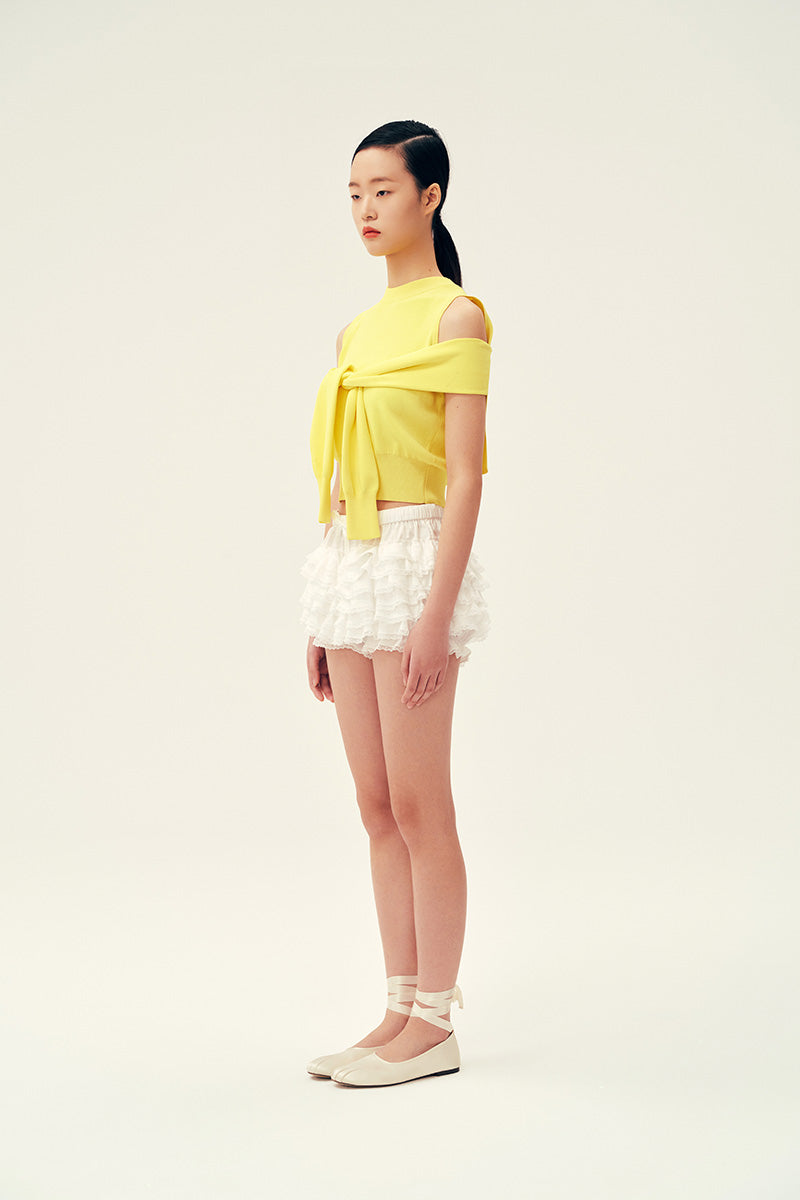 Yellow Martha vest from Chictopia, a stylish sleeveless top with a fitted design, perfect for casual or layered looks.