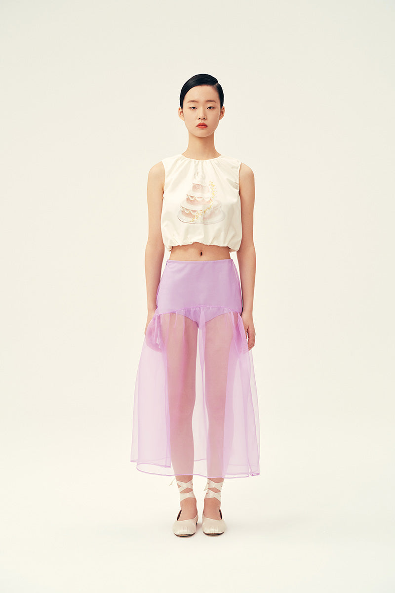 Chictopia Lois Lilac Midi Skirt displayed on a hanger, showcasing its soft fabric and elegant length for stylish everyday wear.