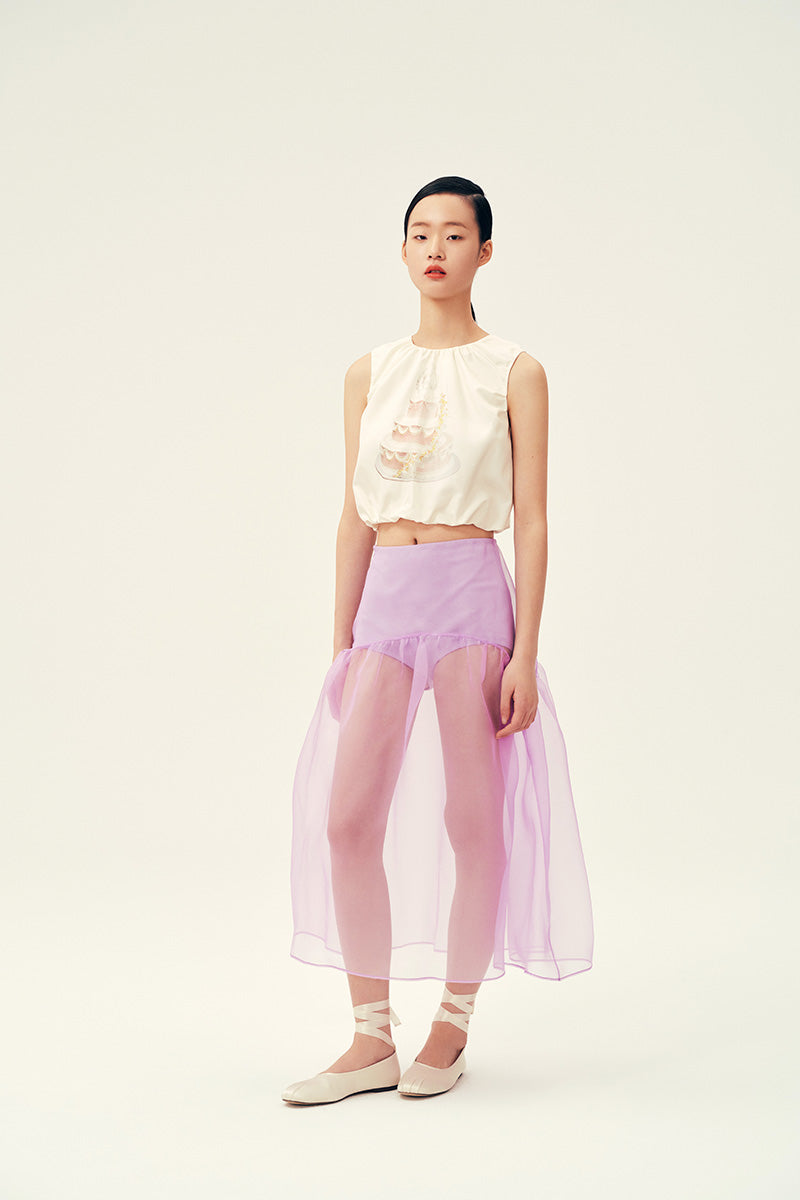 Lilac Lois midi skirt by Chictopia, featuring a flowy design and waistband, displayed on a hanger or model.